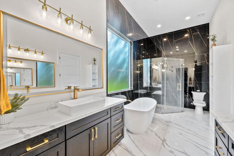 The high ceilings in the bathroom are a premium luxury that make the space feel larger, brighter and like a high end spa.
