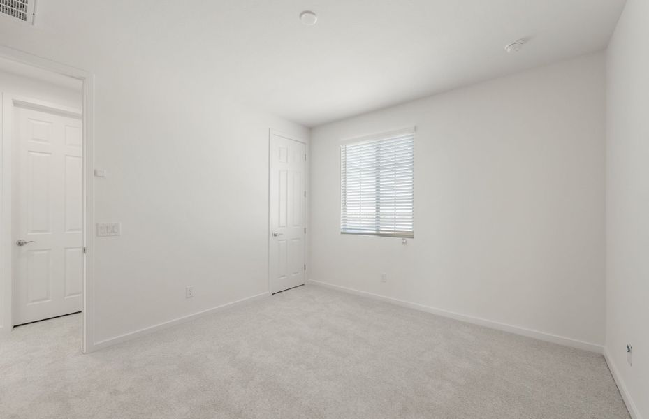 Spacious, unfurnished interior of a new home in Soleo, San Tan Valley (Image 29).