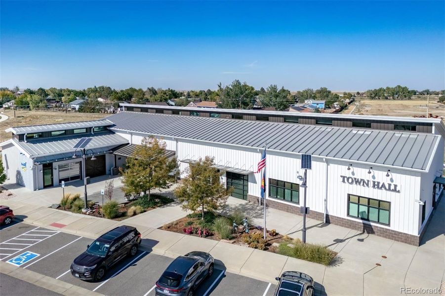 Front exterior of a new home in Muegge Farms, Bennett, CO, highlighting curb appeal (Image 2). Front exterior of a new home in Muegge Farms, Bennett, CO, highlighting curb appeal (Image 2).