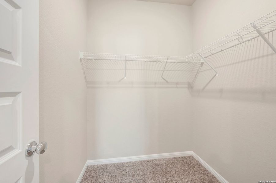 Spacious, unfurnished interior of a new home in Mesquite Ridge, San Antonio (Image 26).