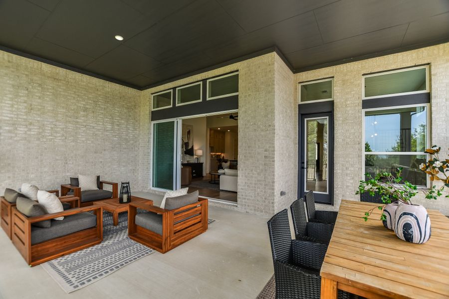 Exterior details and patio area of a home in Wolf Ranch – West Bend, Georgetown (Image 4).