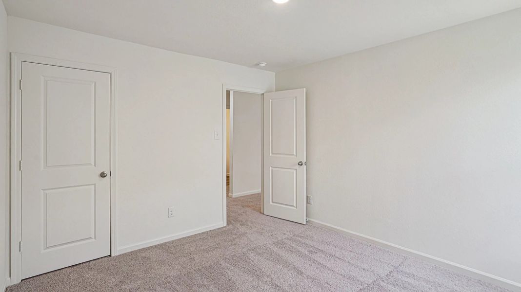 Representative unfurnished interior of a home built from the Pioneer by Starlight Homes in Avalon Ridge, Cut and Shoot (Image 23).