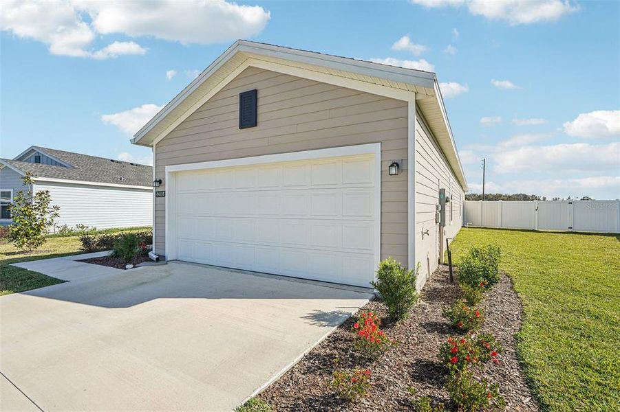 Front exterior of a new home in Heath Preserve: Heath Preserve - The Enclave, Ocala, FL, highlighting curb appeal (Image 1). Front exterior of a new home in Heath Preserve: Heath Preserve - The Enclave, Ocala, FL, highlighting curb appeal (Image 1).