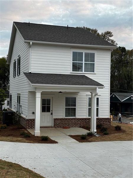 Front exterior of a new home in , Marietta, GA, highlighting curb appeal (Image 2). Front exterior of a new home in , Marietta, GA, highlighting curb appeal (Image 2).