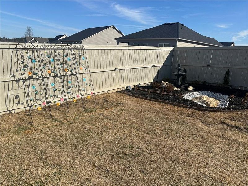 Exterior details and patio area of a home in , Homer (Image 33). Exterior details and patio area of a home in , Homer (Image 33).