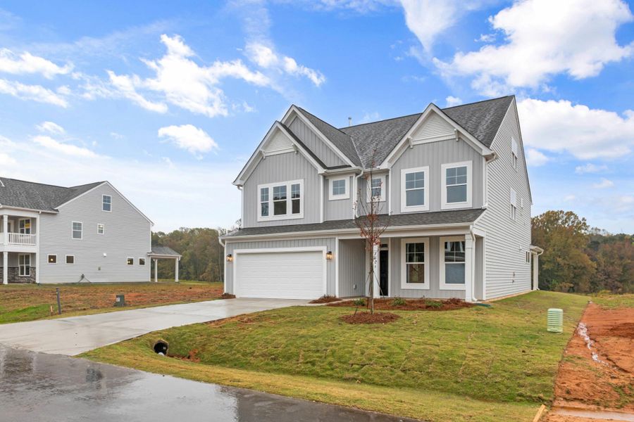 Front exterior of a new home in Monterra, Kernersville, NC, highlighting curb appeal (Image 26).