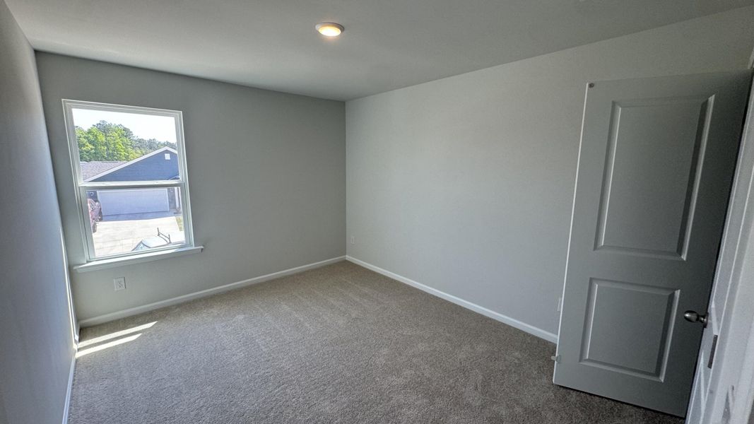 Spacious, unfurnished interior of a new home in Watson Hill, Summerville (Image 31).