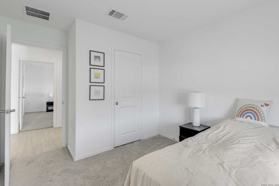 Furnished interior view inside a new home in Mission del Lago, San Antonio (Image 28).