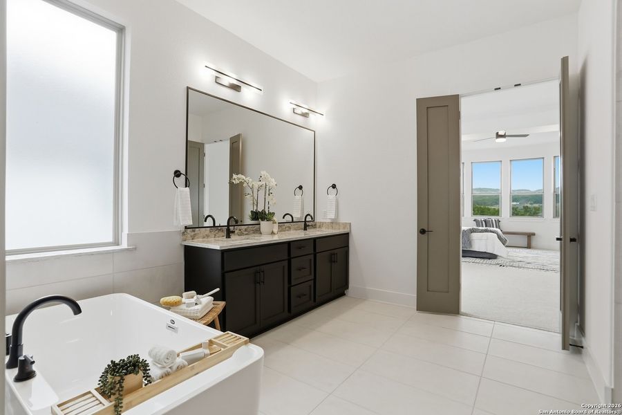 Furnished interior view inside a new home in Kinder Ranch - 70', San Antonio (Image 16).