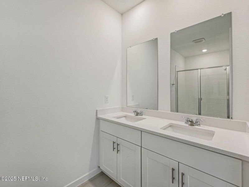 Furnished interior view inside a new home in Lakes at Bella Lago - Signature Series, Green Cove Springs (Image 16).