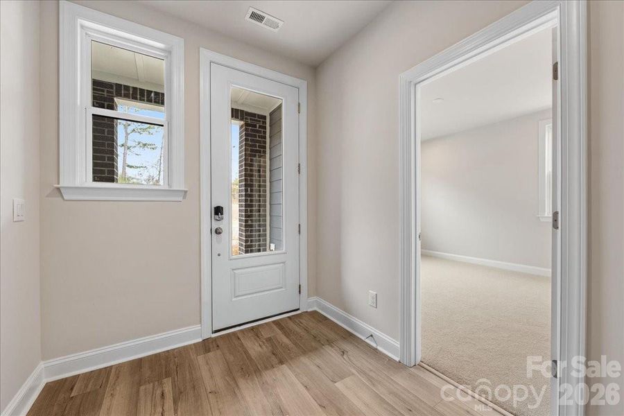 Foyer with entrance to first floor en suite
