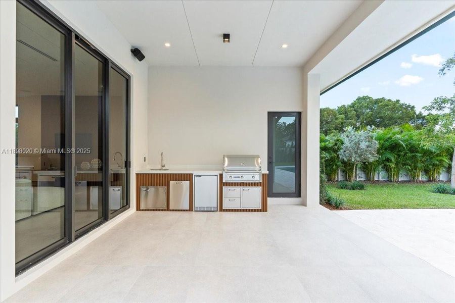 Exterior details and patio area of a home in , Miami (Image 1). Exterior details and patio area of a home in , Miami (Image 1).