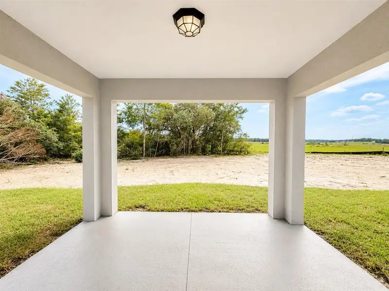 Exterior details and patio area of a home in , Ocala (Image 22).
