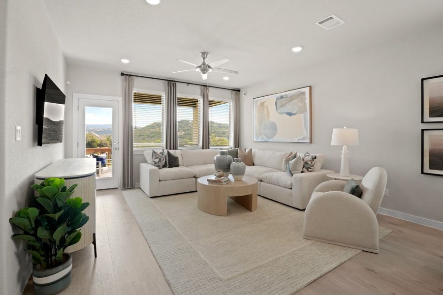 Living Room in the Lakeside at Tessera Willow model home in Lago Vista TX by Trophy Signature Homes