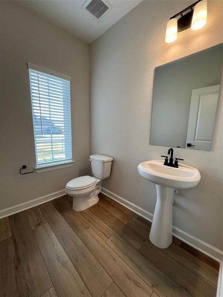 The downstairs powder bathroom.