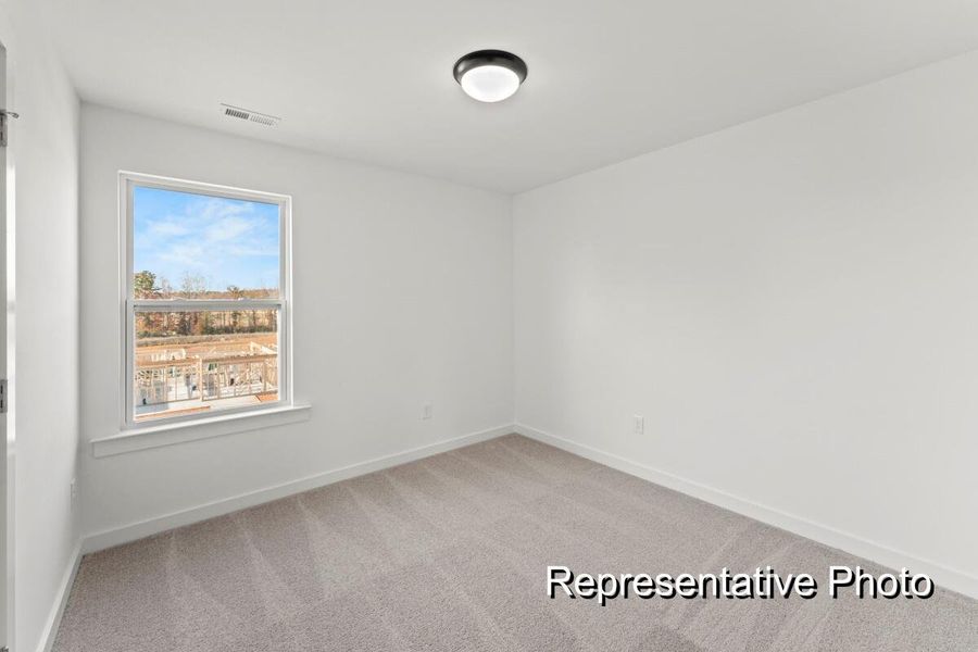 Spacious, unfurnished interior of a new home in Reeves Crossing, St. George (Image 16).