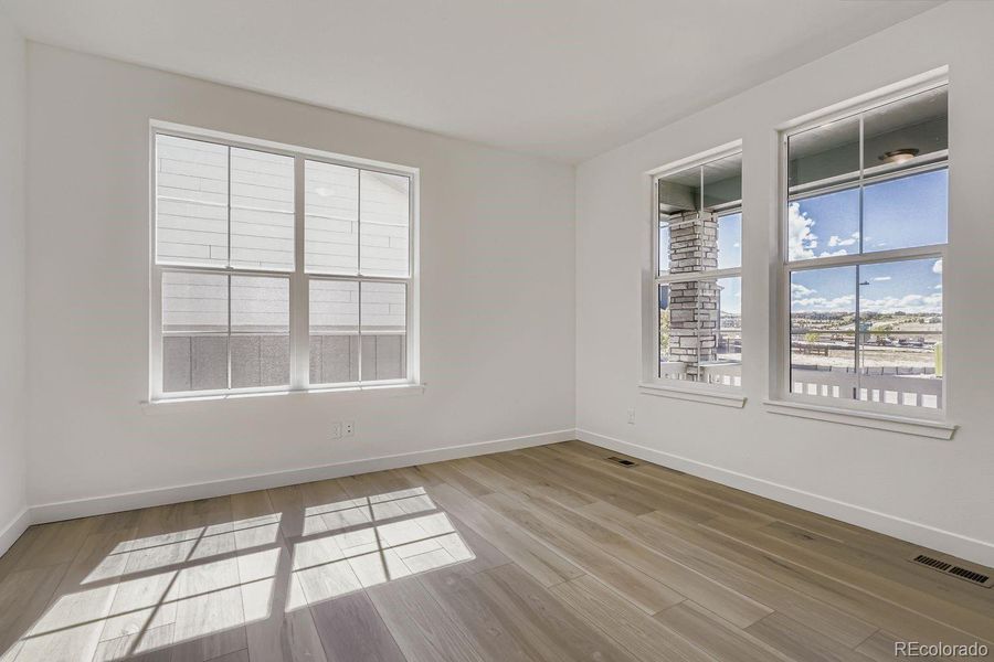Spacious, unfurnished interior of a new home in Newlin Crossing: The Monarch Collection, Parker (Image 11). Spacious, unfurnished interior of a new home in Newlin Crossing: The Monarch Collection, Parker (Image 11).