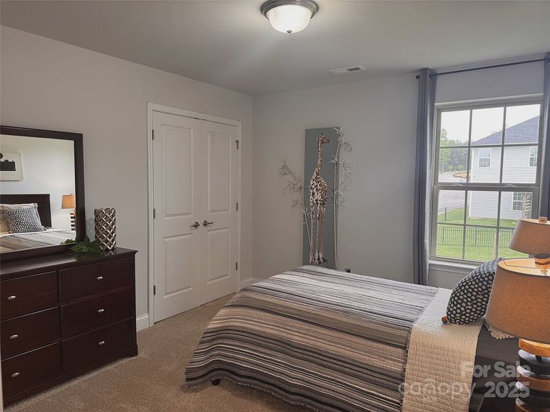 Furnished interior in a model home at Village at Parkside in Gastonia (Image 8).