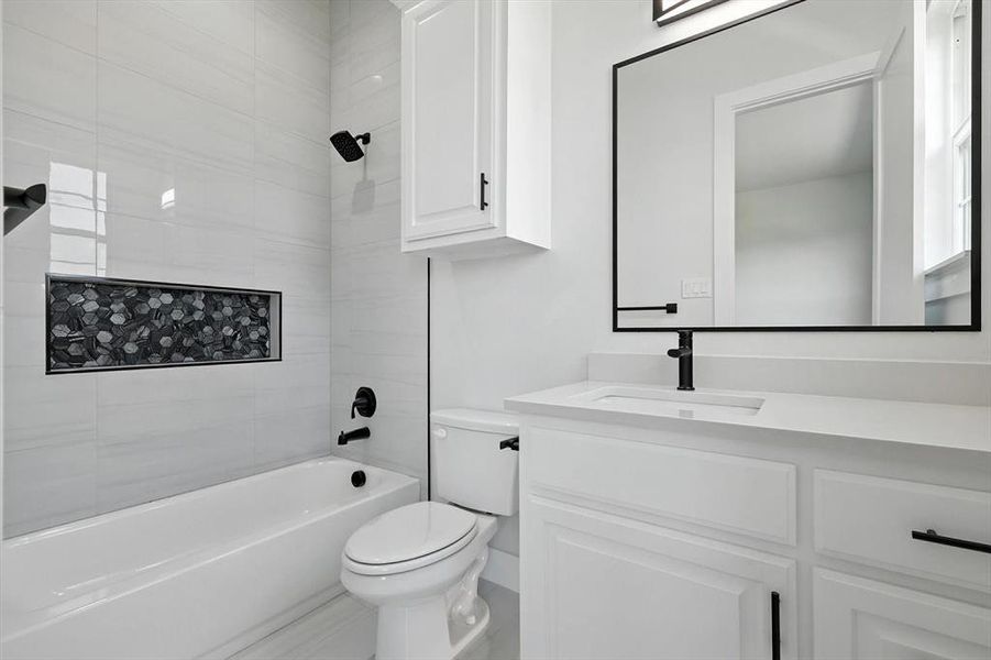 Full bath featuring vanity and shower / bath combination Full bath featuring vanity and shower / bath combination