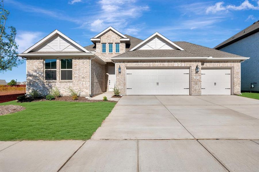 Front exterior of a new home in Gateway Parks, Forney, TX, highlighting curb appeal (Image 1). Front exterior of a new home in Gateway Parks, Forney, TX, highlighting curb appeal (Image 1).