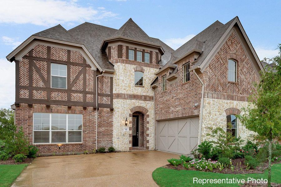 Representative exterior photo of a completed home built from the Downton Abbey by Grand Homes in Monterra, Fate, TX (Image 2). Representative exterior photo of a completed home built from the Downton Abbey by Grand Homes in Monterra, Fate, TX (Image 2).
