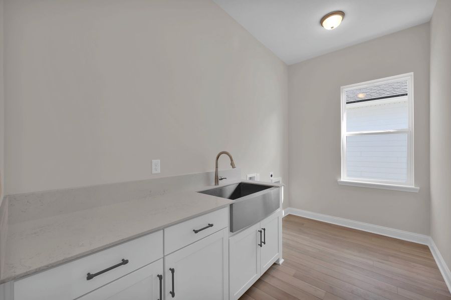 Representative furnished interior of a home built from the Stella by Riverside Homes in Hidden Creek at SilverLeaf, St. Augustine (Image 21).