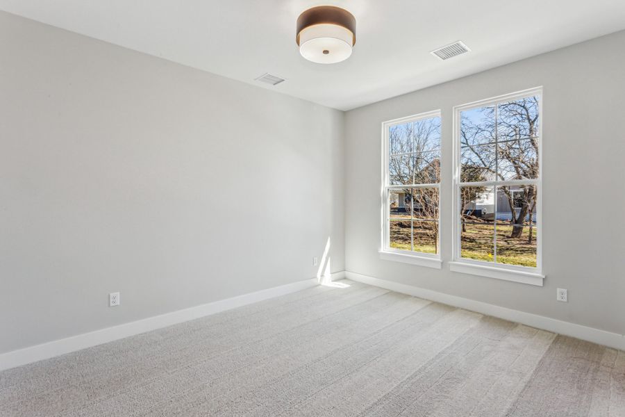 Spacious, unfurnished interior of a new home in The Courtyards at Jacobs Farm, Wichita (Image 15).