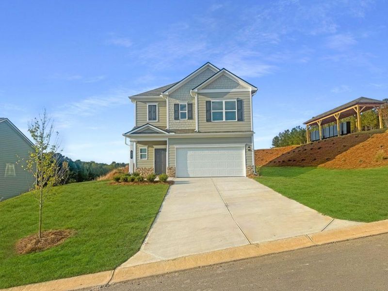 Front exterior of a new home in Varnell Preserve, Dalton, GA, highlighting curb appeal (Image 1). Front exterior of a new home in Varnell Preserve, Dalton, GA, highlighting curb appeal (Image 1).