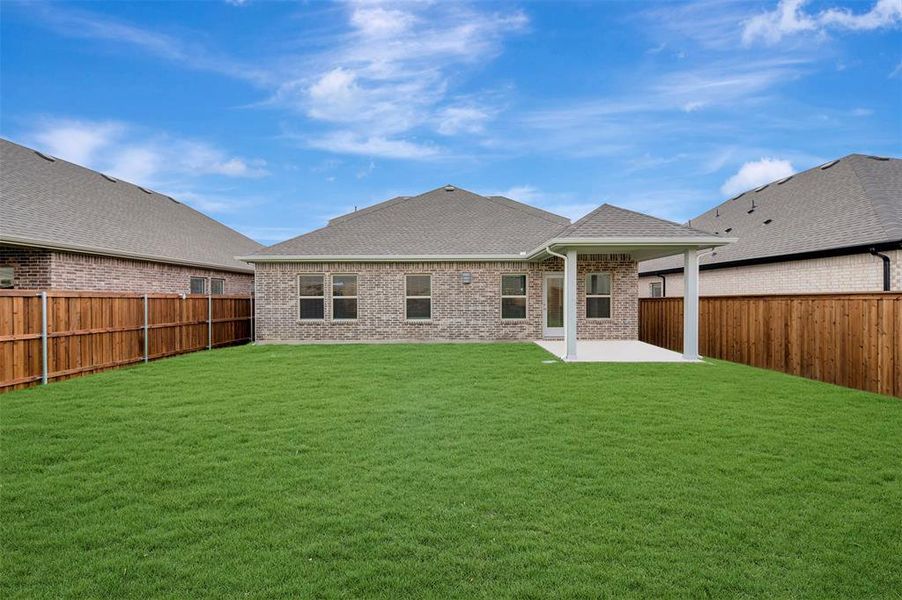 Exterior details and patio area of a home in Aspire at Reunion, Newark (Image 23).