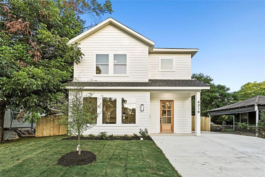 Front exterior of a new home in , Dallas, TX, highlighting curb appeal (Image 19).