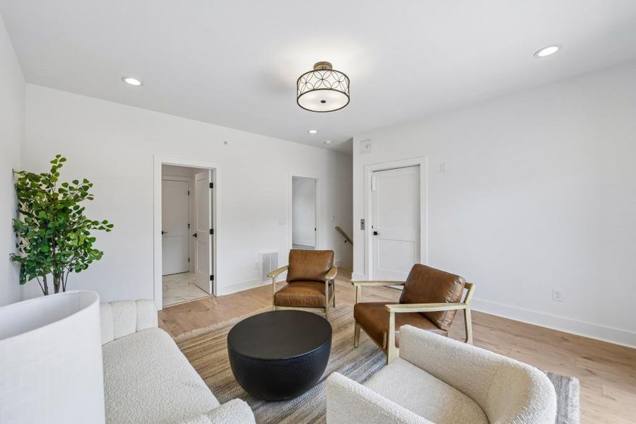 Furnished interior view inside a new home in Skyview On Broad, Sugar Hill (Image 7). Furnished interior view inside a new home in Skyview On Broad, Sugar Hill (Image 7).