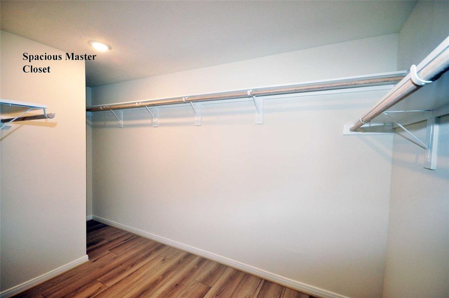 Spacious closet in master bedroom. Spacious closet in master bedroom.