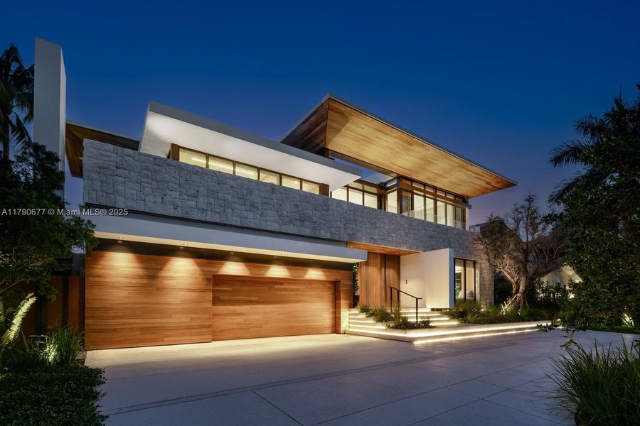 Front exterior of a new home in , Golden Beach, FL, highlighting curb appeal (Image 13).