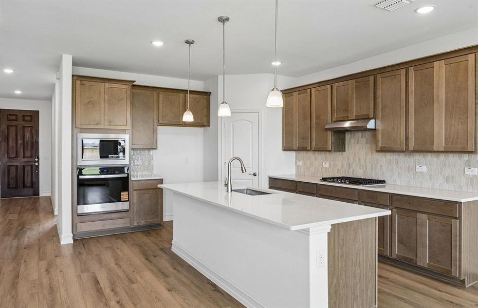 Kitchen with eat in bartop island