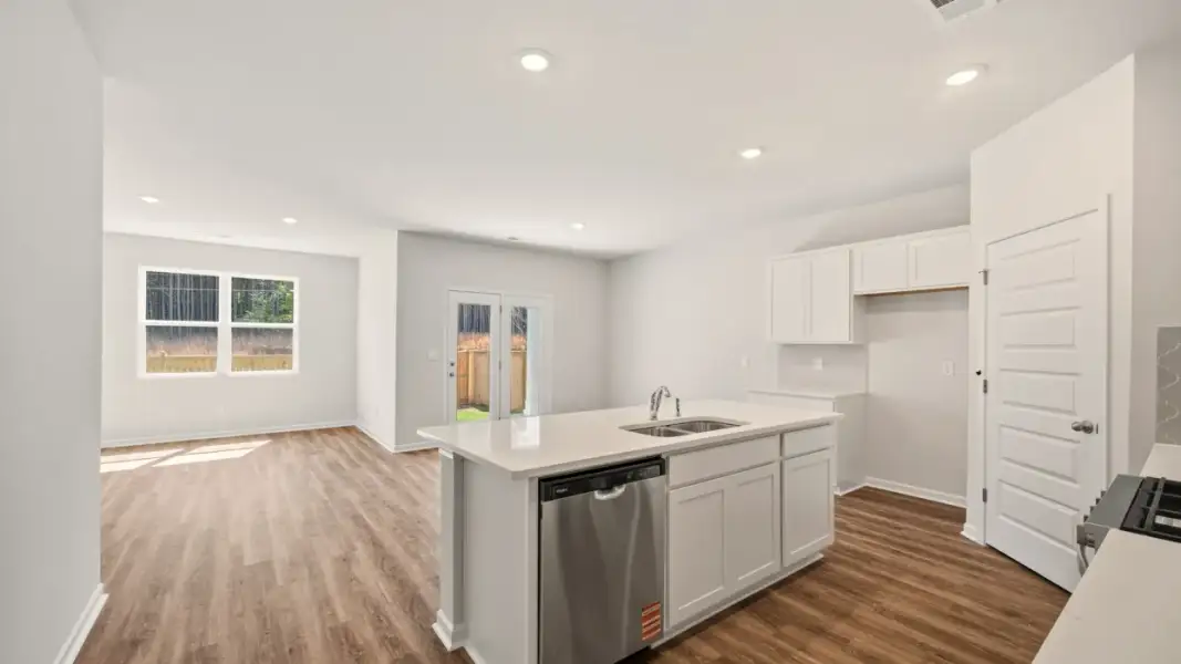 Representative furnished interior of a home built from the Cali by D.R. Horton in Branford Crossing, Stockbridge (Image 5).