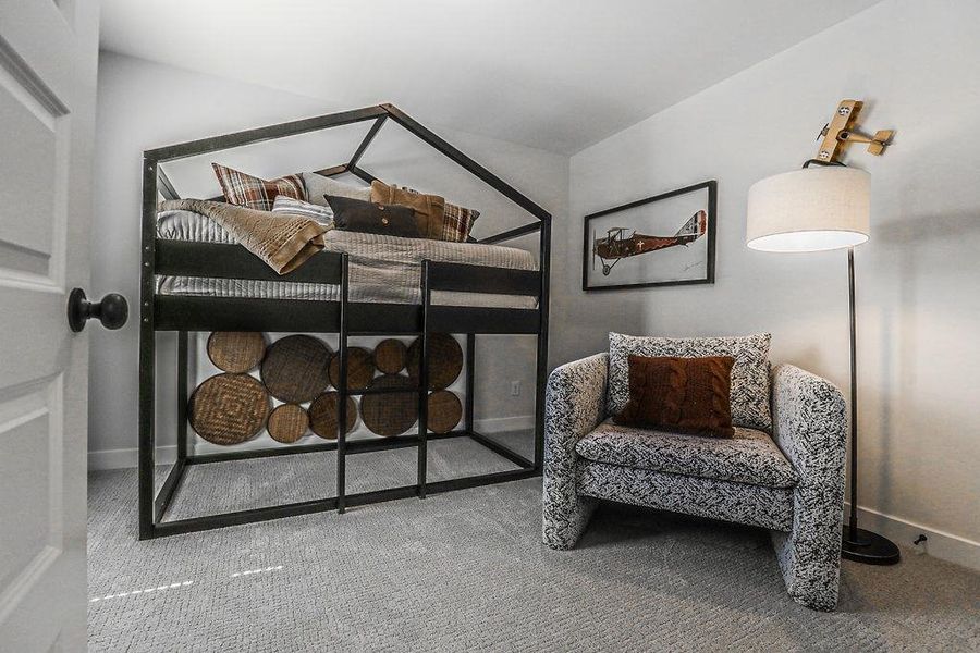 Bedroom with carpet and baseboards