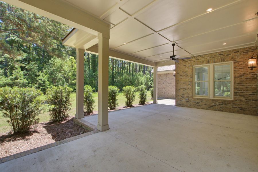 Exterior details and patio area of a home in , Johns Island (Image 29).