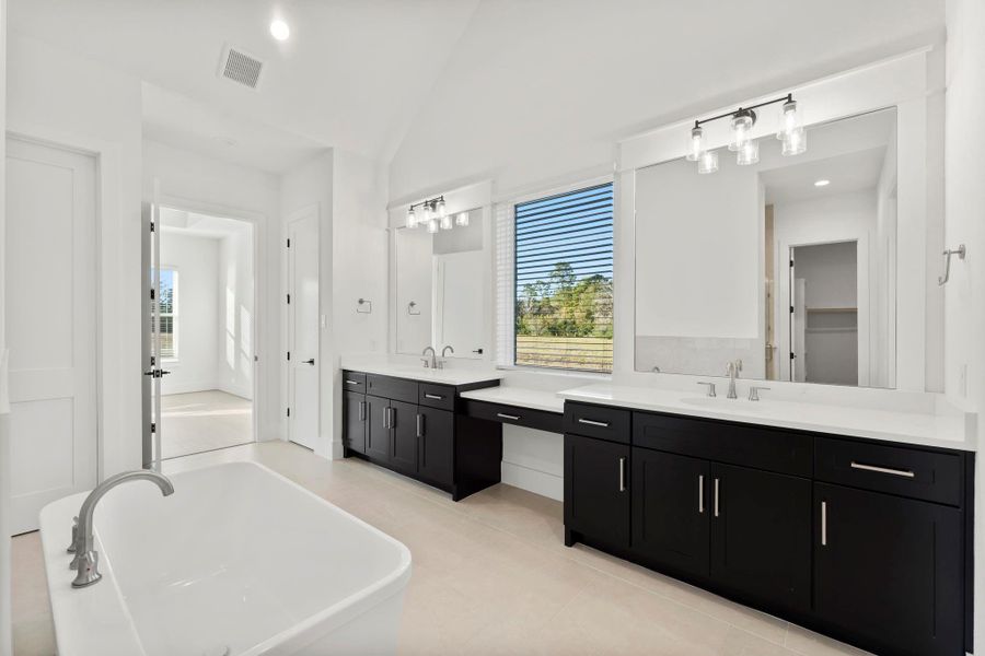 Furnished interior view inside a new home in Homestead Hill, New Waverly (Image 6).