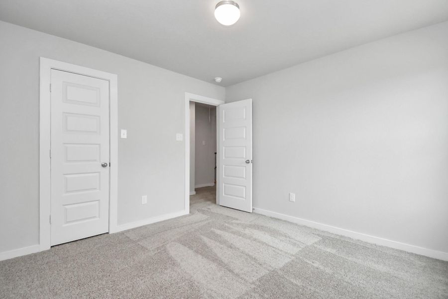 Generously sized secondary bedrooms, complete with spacious closets and soft, inviting carpeting. Generously sized secondary bedrooms, complete with spacious closets and soft, inviting carpeting.