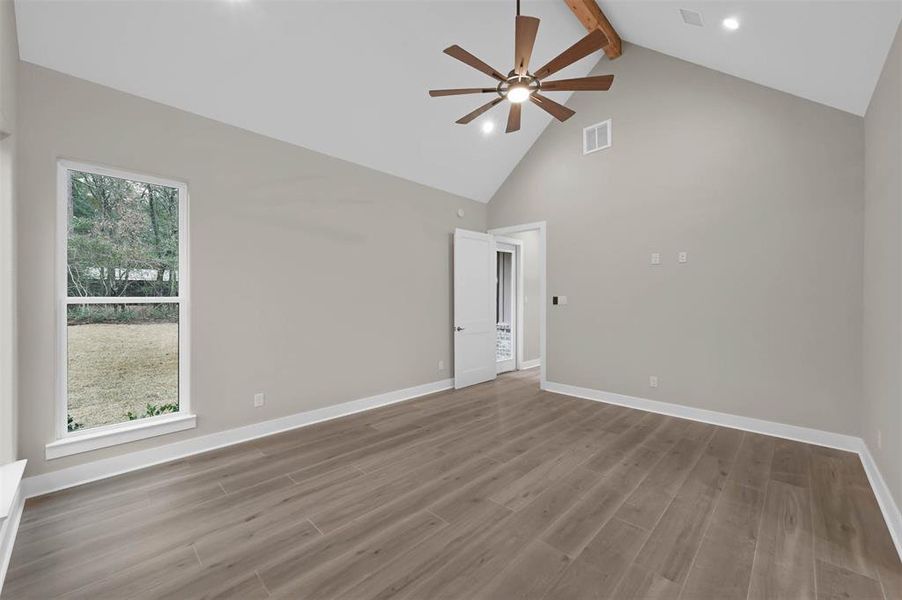 Another view of the primary bedroom.