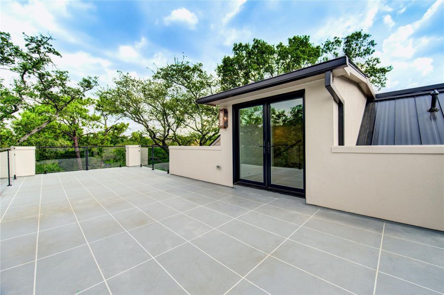 Exterior details and patio area of a home in , Houston (Image 22).