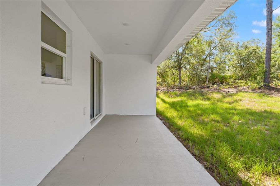 Exterior details and patio area of a home in , Citrus Springs (Image 25).