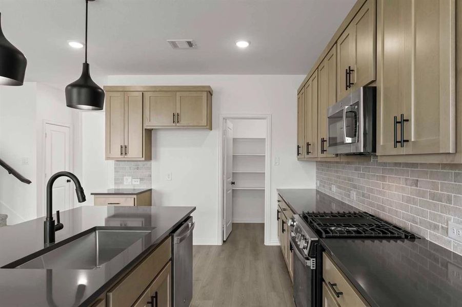Furnished interior view inside a new home in Coyote Meadows 50s, Anna (Image 9). Furnished interior view inside a new home in Coyote Meadows 50s, Anna (Image 9).