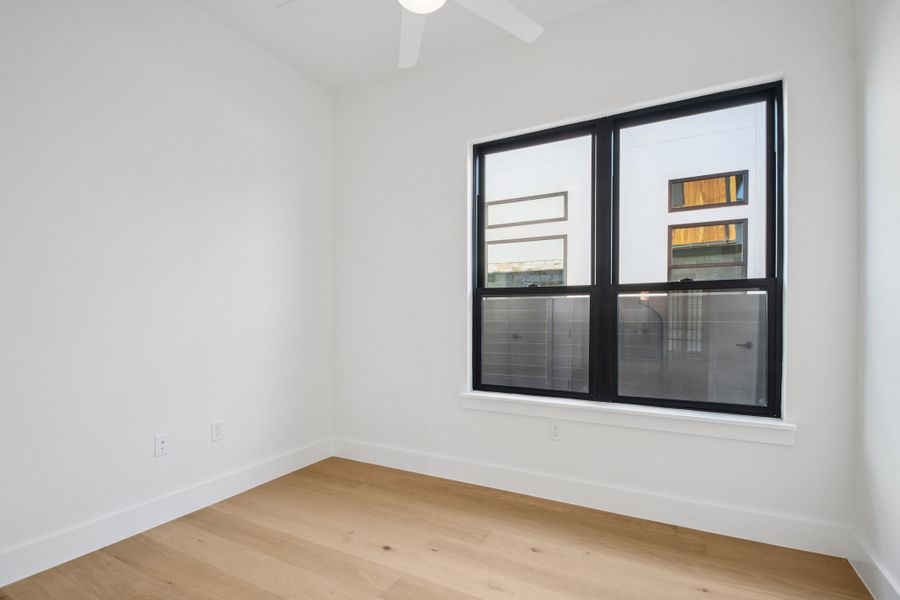 Spacious, unfurnished interior of a new home in Milky Way at River Place, Austin (Image 27).