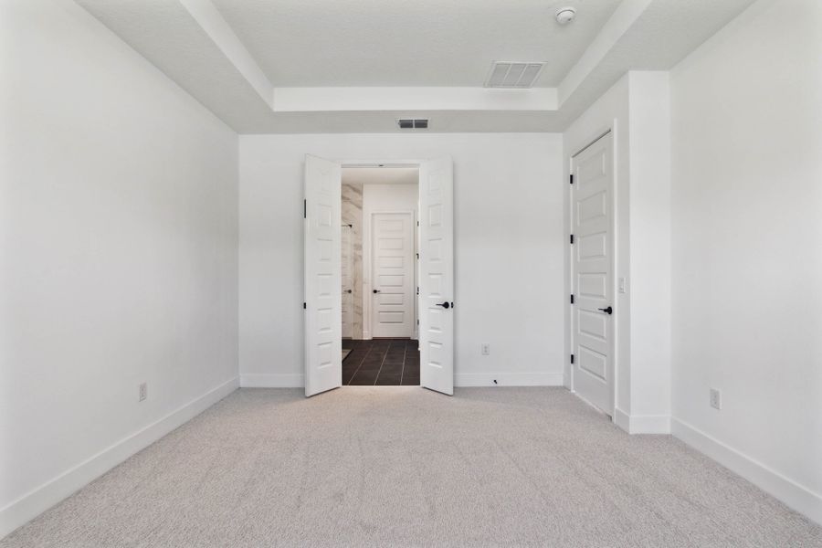 Representative unfurnished interior of a home built from the Hemingway by Rockwell Homes in Northlake At Ovation, Winter Garden (Image 22).