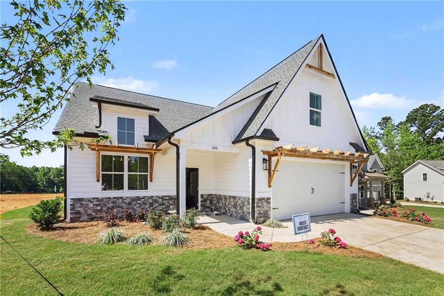 Front exterior of a new home in , Winston, GA, highlighting curb appeal (Image 17).