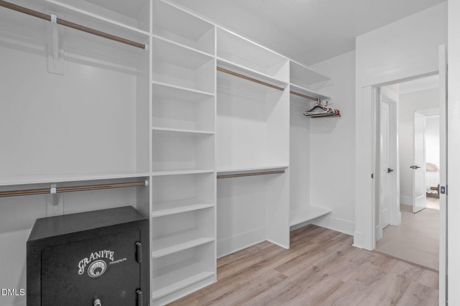 Primary Walk-In Closet Primary Walk-In Closet