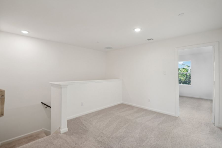 Representative unfurnished interior of a home built from the Crescent by Starlight Homes in Broadmoor Village, Cedar Hill (Image 24).
