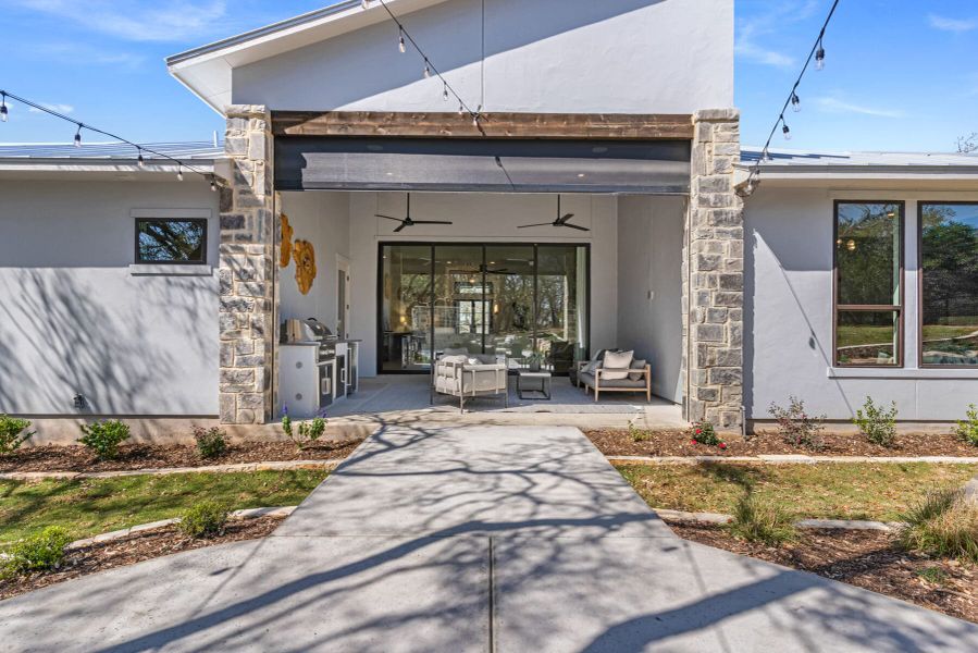 Exterior details and patio area of a home in Belle Oaks, Bulverde (Image 27).