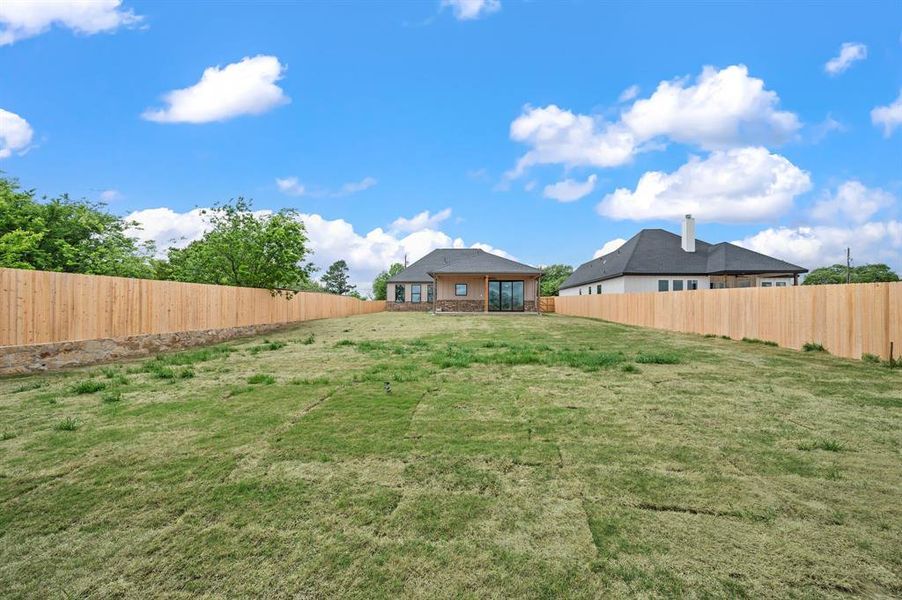 Exterior details and patio area of a home in , Springtown (Image 4).